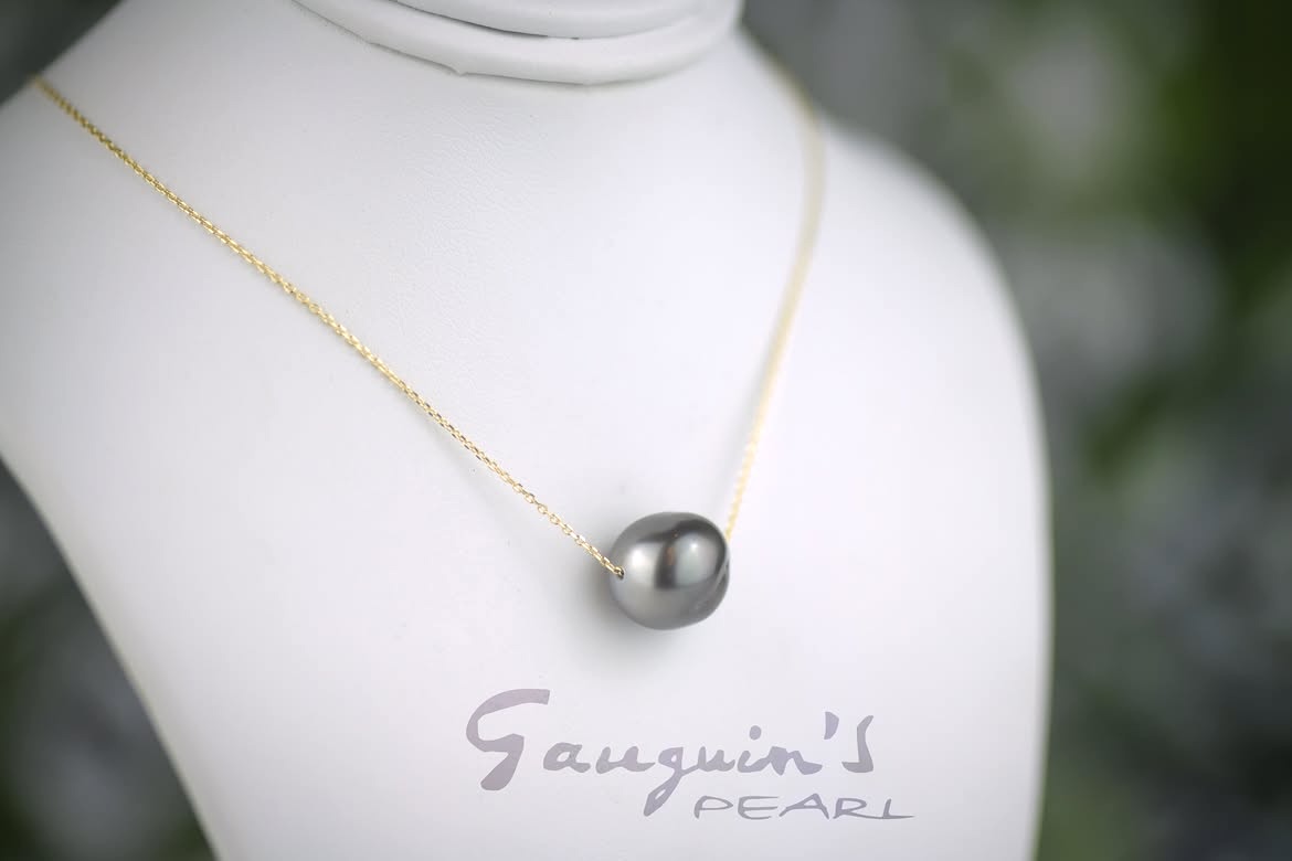 Tahitian pearl drilled through for a chain